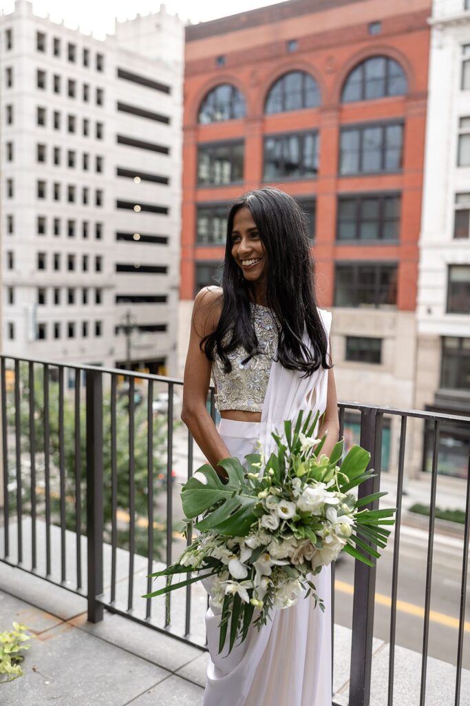 Outdoor balcony bridal portraits at Shinola Hotel in Detroit, MI