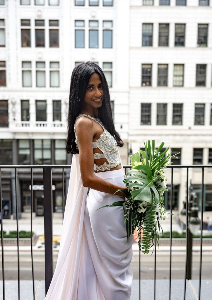 Outdoor balcony bridal portraits at Shinola Hotel in Detroit, MI