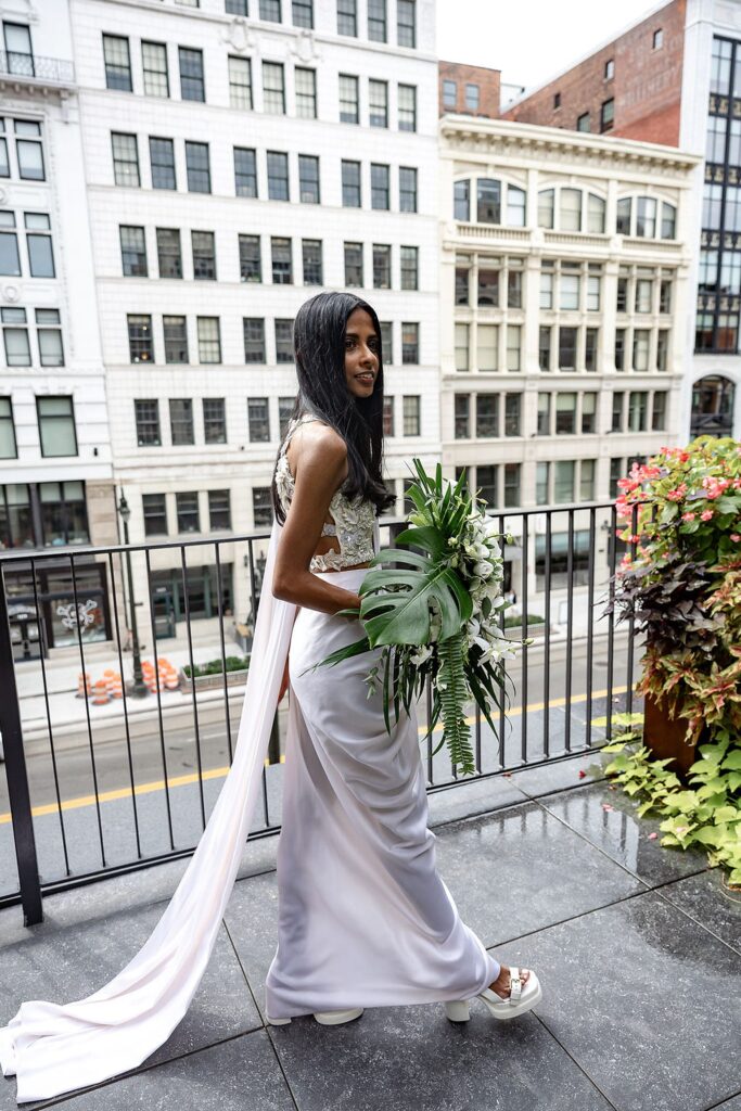 Outdoor balcony bridal portraits at Shinola Hotel in Detroit, MI