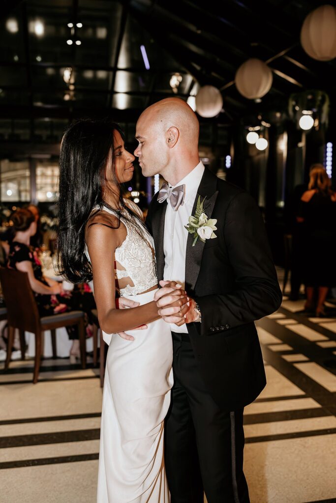 Bride and groom dancing during their Shinola Hotel wedding reception in The Birdy Room