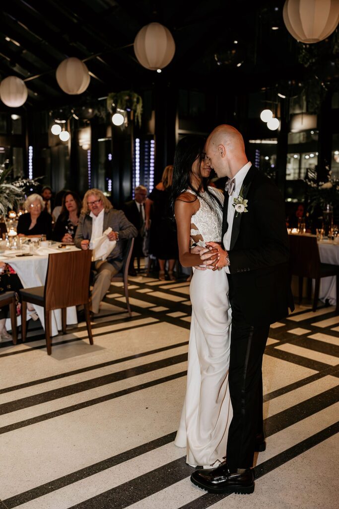 Bride and groom dancing during their Shinola Hotel wedding reception in The Birdy Room