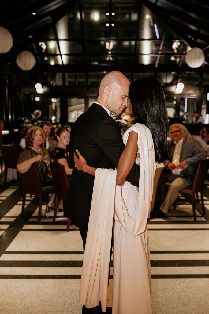 Bride and groom dancing during their Shinola Hotel wedding reception in The Birdy Room