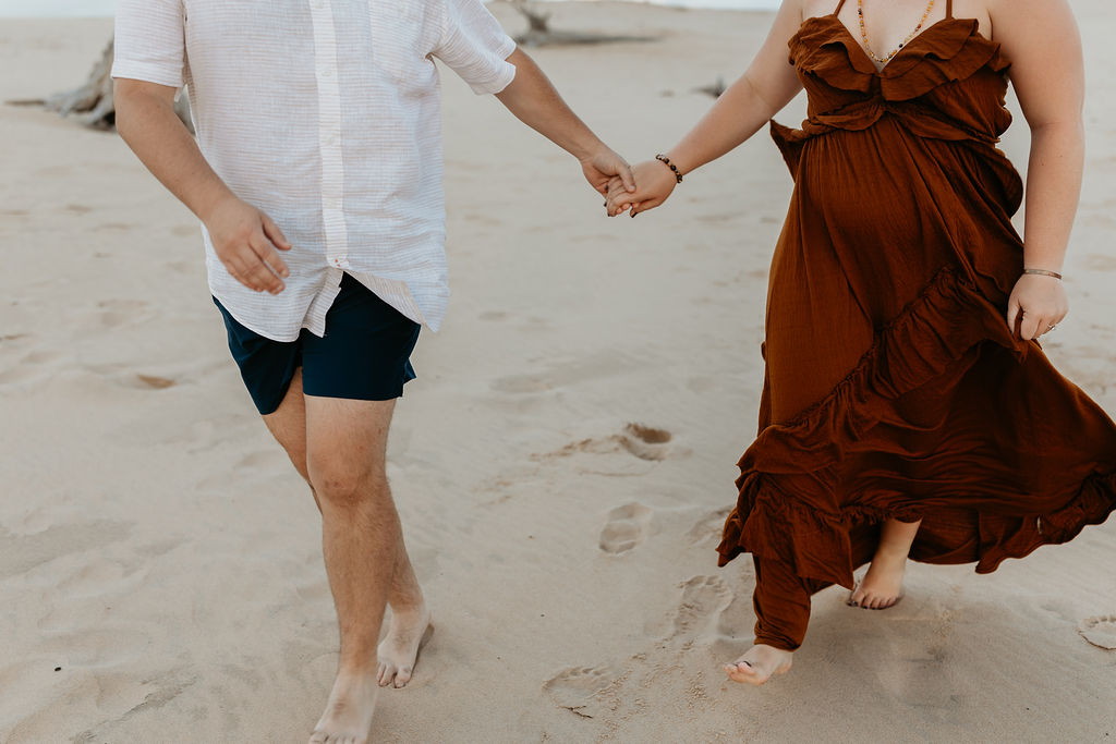 Couple walking along the beach