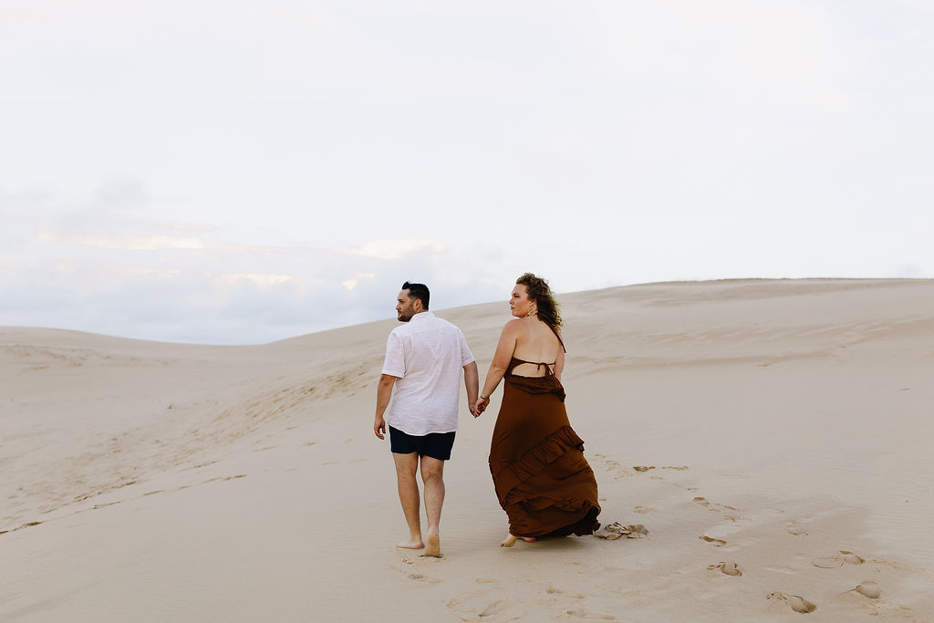 Couple walking along the beach