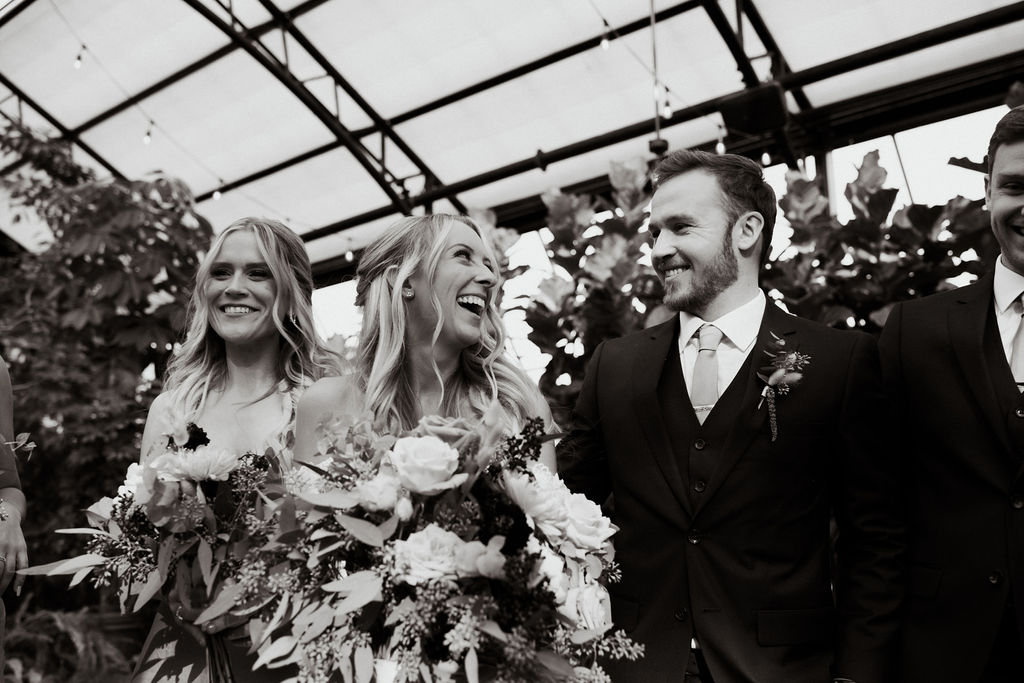 Full wedding party portraits at Planterra Conservatory in Michigan