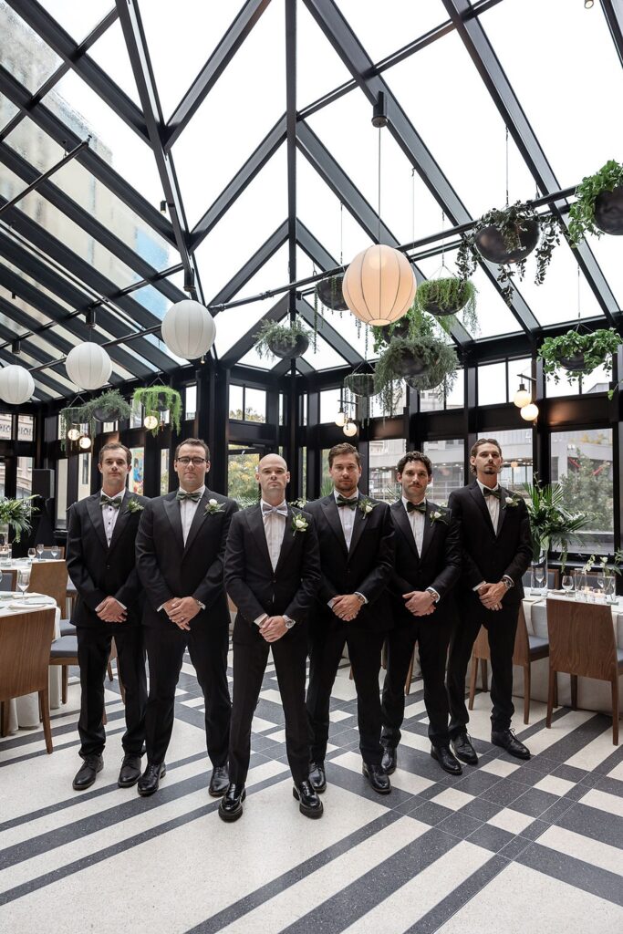 Groom and groomsmen portraits from a Shinola Hotel wedding on The Terrace