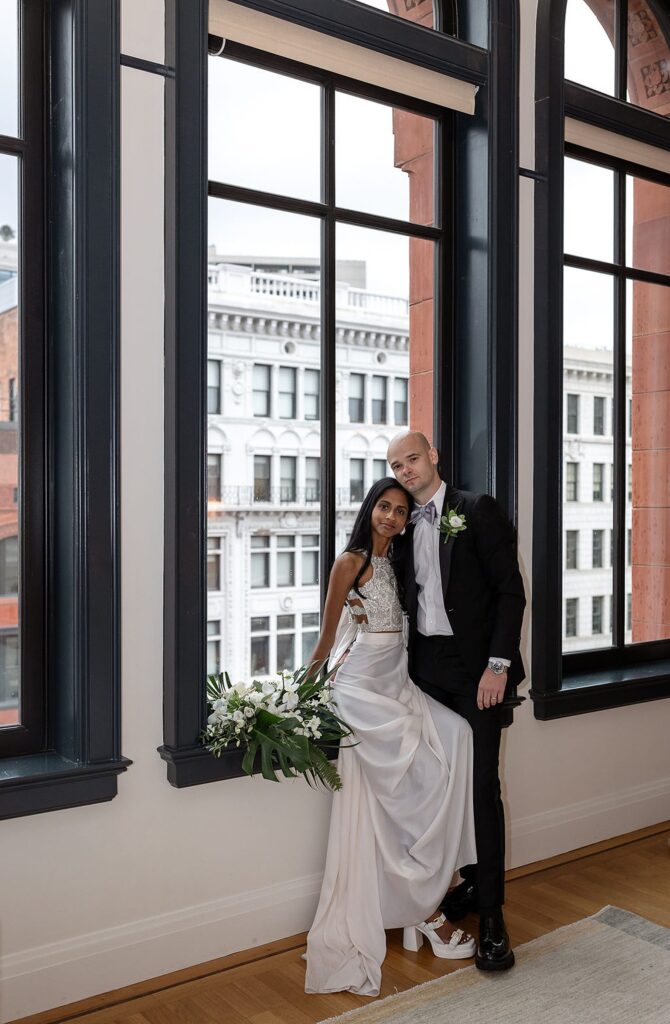 Bride and grooms indoor Shinola Hotel wedding portraits in Detroit, Michigan