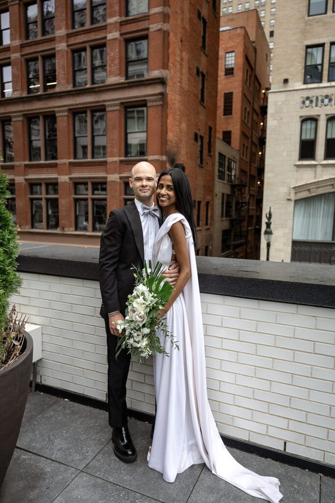 Bride and grooms outdoor Shinola Hotel wedding portraits on The Terrace