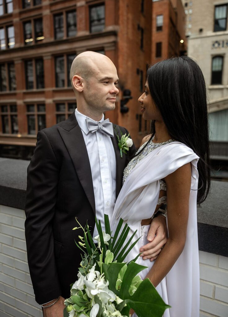 Bride and grooms outdoor Shinola Hotel wedding portraits on The Terrace