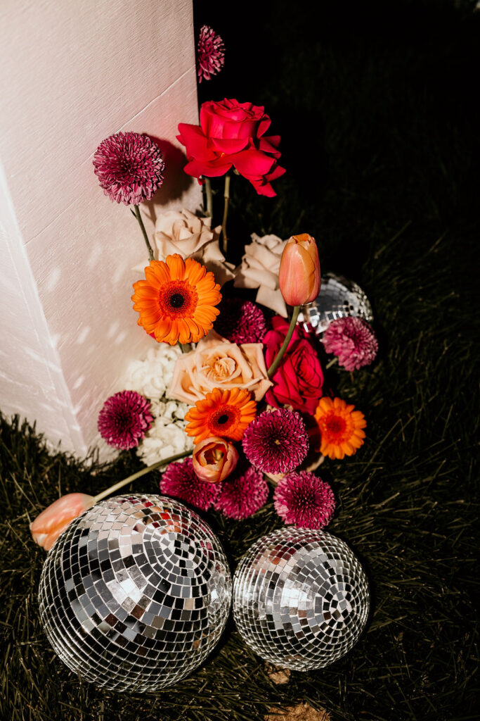 Wedding reception flash shots of florals and disco balls