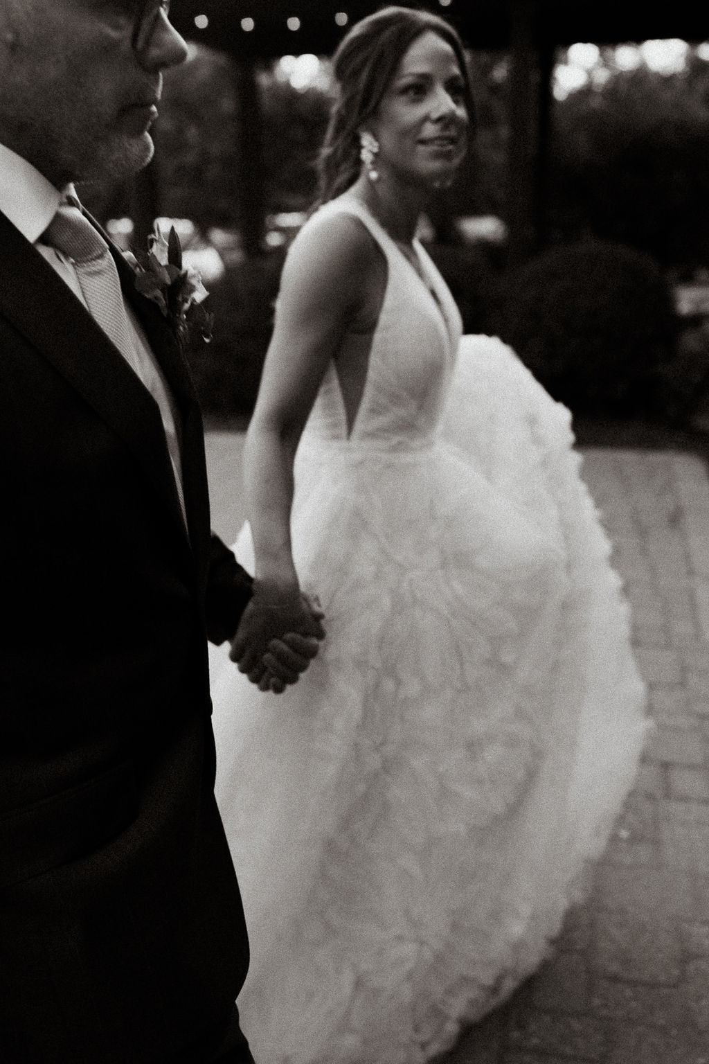 Bride and groom walking during portraits